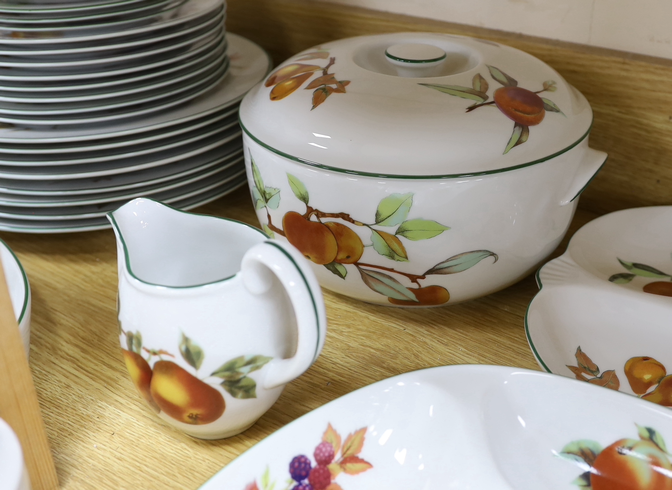 A large quantity of Royal Worcester Evesham Vale serving dishes and dinnerwares